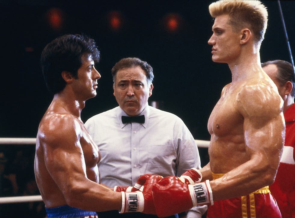 Cinema e política: Stallone (esquerda) e Lundgren (direita) como Rocky Balboa e Ivan Drago, respectivamente, em Rocky 4. Imagem: Divulgação