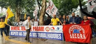 Comerciários de São Paulo exigem o pagamento das verbas rescisórias em protesto na Berrini. Entenda a mobilização.